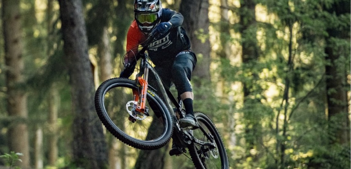 boy jumping GIANT BIKES